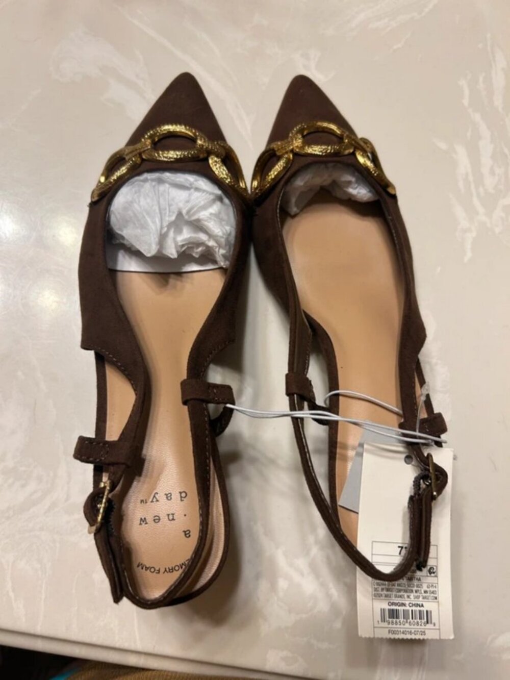 Brown pointed heels